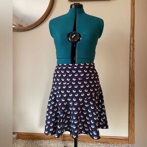 Purple Loft size 6 fit and flare knee length skirt with blue floral detail